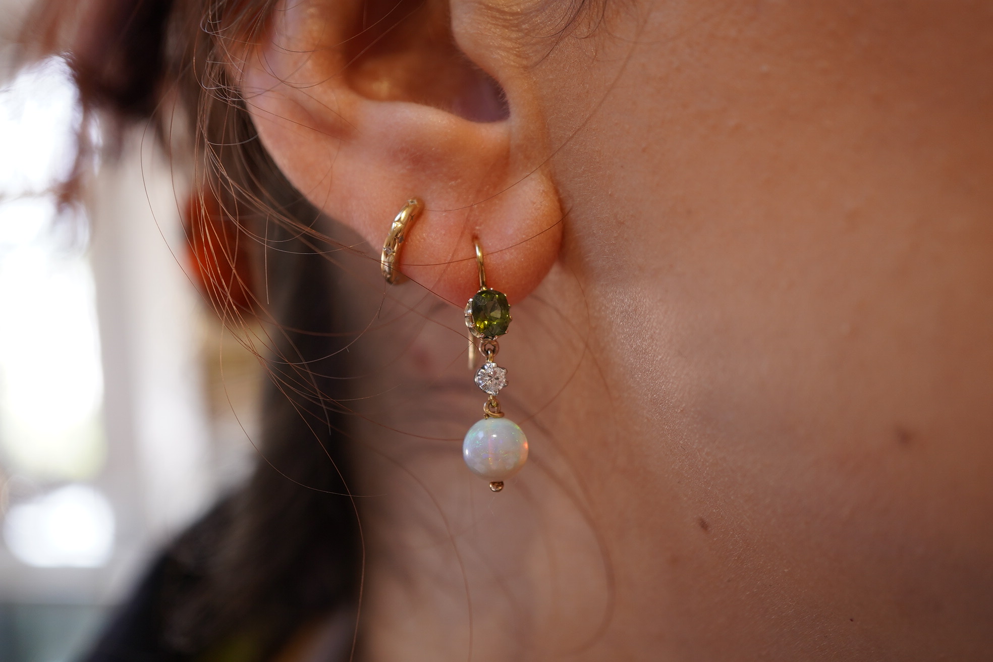 A pair of opal, green zircon and diamond earrings